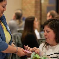 two people playing cards